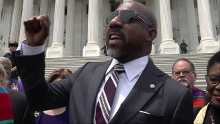 Sen. Raphael Warnock speaks at anti-Big Beautiful Bill vigil