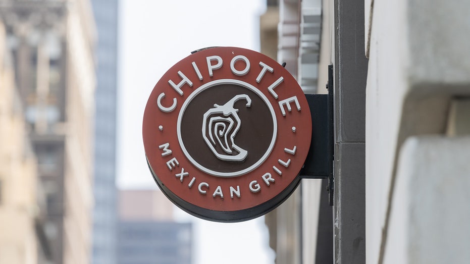 Chipotle restaurant sign on building