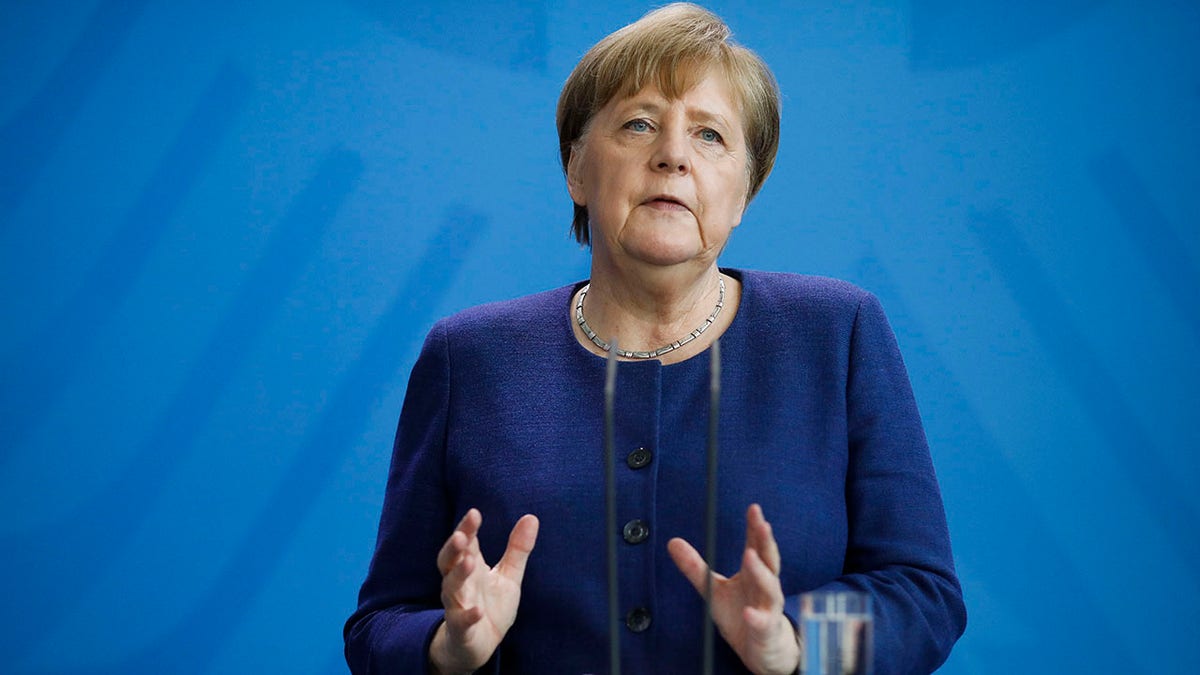 Merkel briefed the media about measures the German government is taking to avoid further spread of the coronavirus at the chancellery in Berlin on Monday. (AP Photo/Markus Schreiber, Pool)