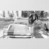 O.J. Simpson poses with his Ferrari