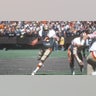 Running back O.J. Simpson #32 of the San Francisco 49ers carries the ball against the Seattle Seahawks