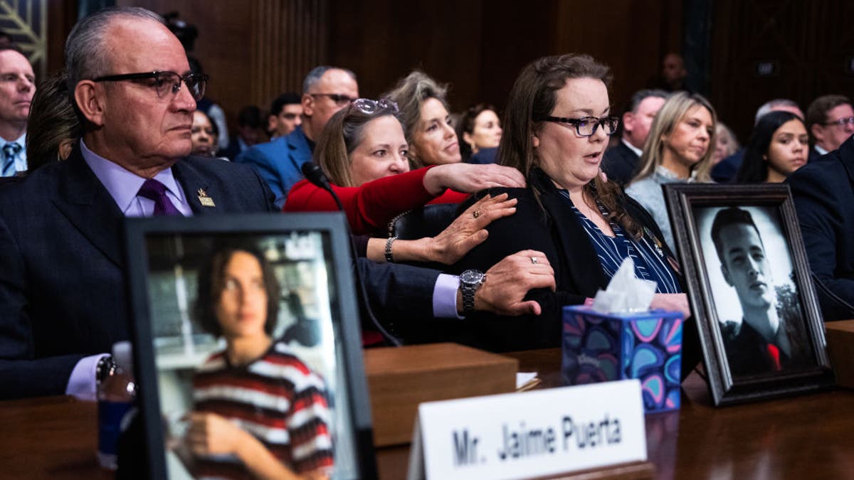 Bridgette Norring, right, whose son, Devin J. Norring, died in 2020 from a pill he thought was Percocet but was actually fentanyl, is comforted during the Senate Judiciary Committee hearing titled, "The Poisoning of America: Fentanyl, its Analogues, and the Need for Permanent Class Scheduling," in the Dirksen Building on Tuesday, Feb. 4, 2025. Jaime Puerta, president of Victims of Illicit Drugs, V.O.I.D., whose son Daniel died in 2020 from a fentanyl pill that he thought was OxyContin, appears at left.