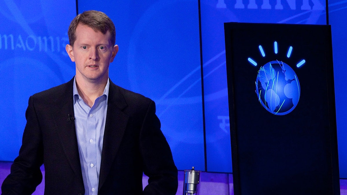 Ken Jennings on Jeopardy set with Watson computer
